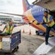 throwing wine into a Southwest plane